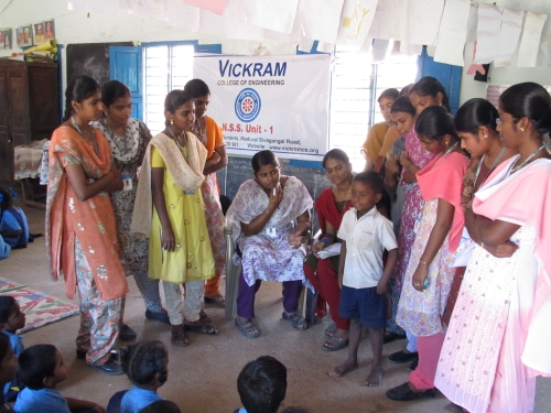 NSS girls involved in conducting singing and drawing competition at Govt. School Poovanthi