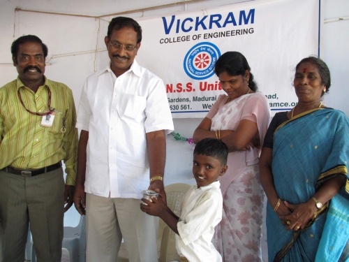 Chairman distributing prizes