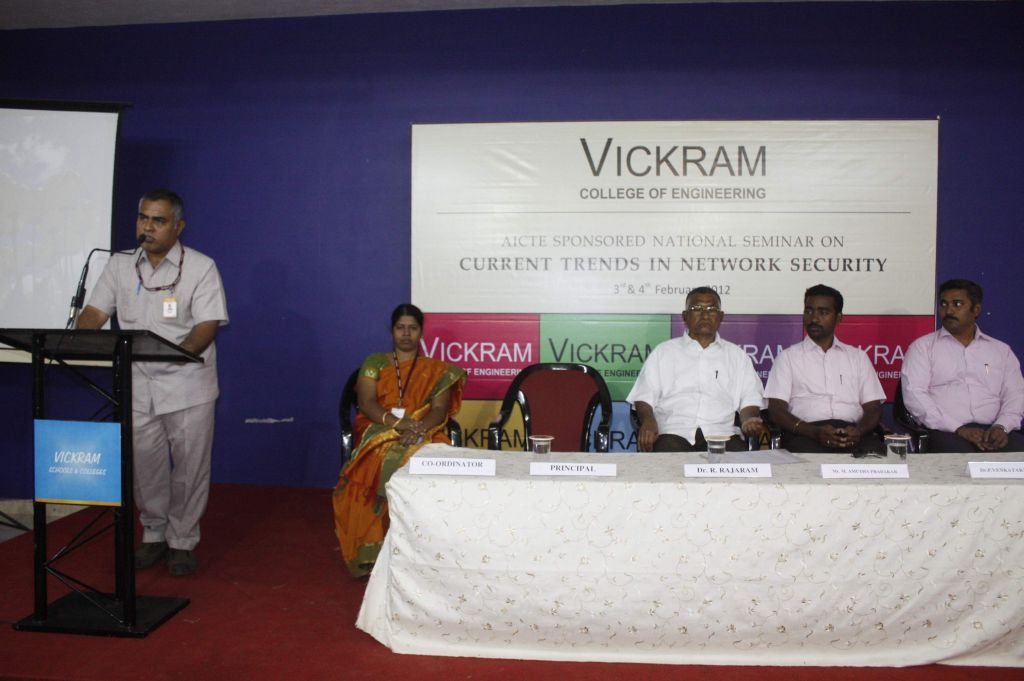 Principal addressing the gathering at inaugural function
